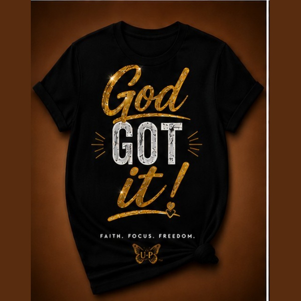 GOD GOT IT! design shown on black apparel