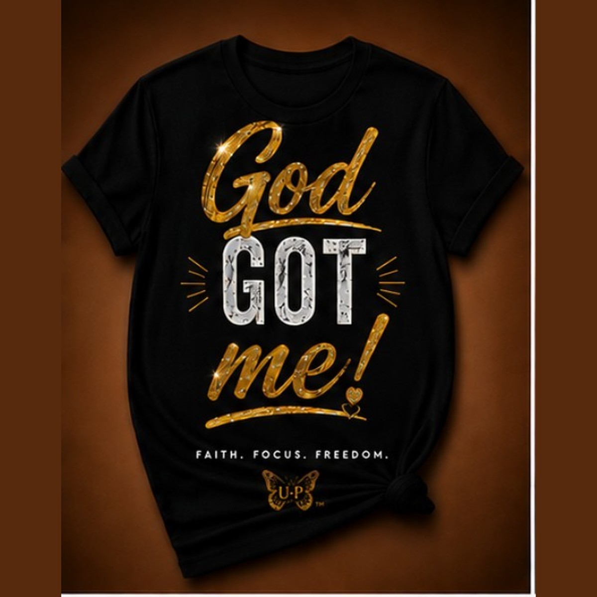 GOD GOT ME! design shown on black apparel
