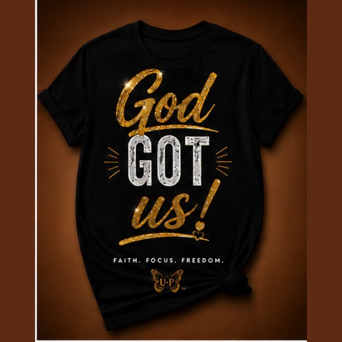 GOD GOT US! design shown on black apparel
